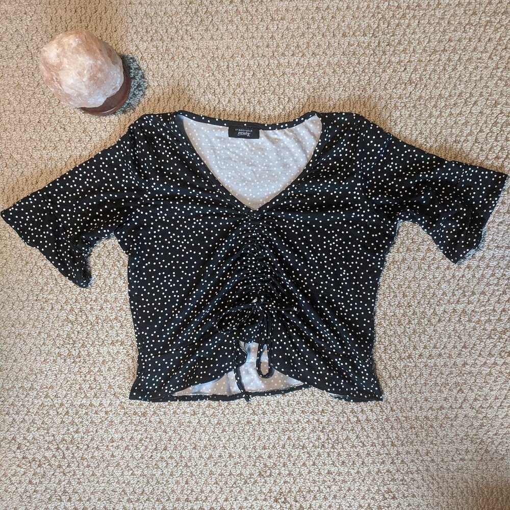 Black cinch-up polka dot crop top